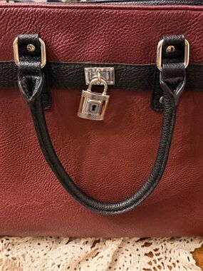 Structured Burgundy and Black Handbag with Padlock Detail